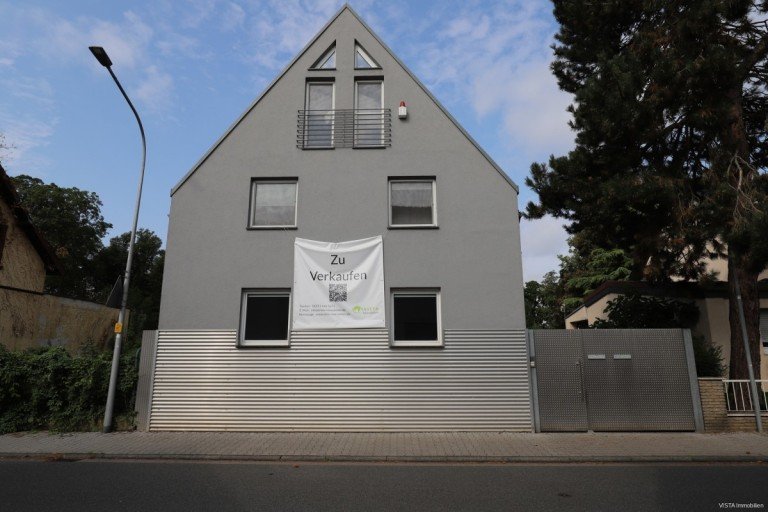 Aussensicht Stra�enseite Pfungstadt Einfamilienhaus Modernes Einfamilienhaus mit offenem K�chenbereich und Wellnessbad - Ihr Traum vom Eigenheim