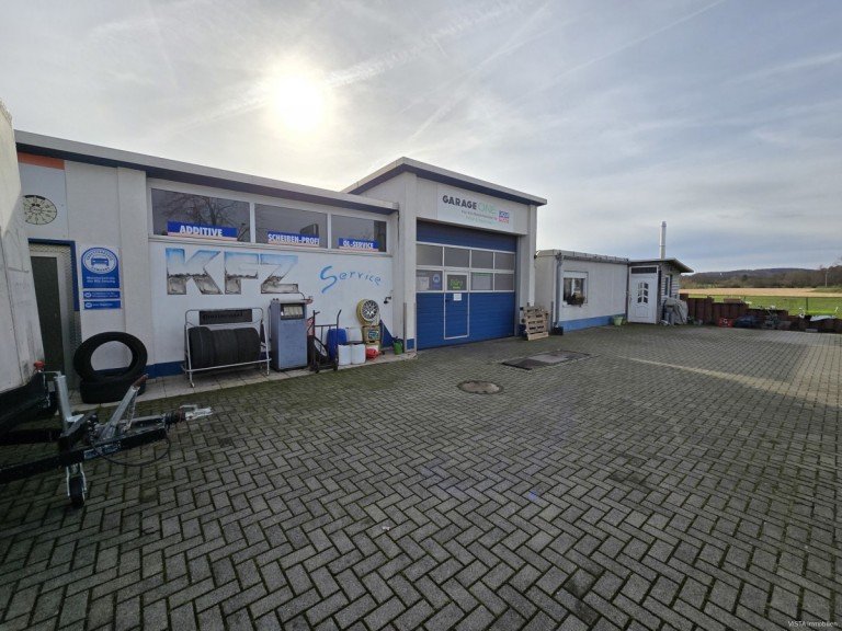 Aussenansicht Ro�dorf Werkstatt **RESERVIERT**Attraktives Investitionsobjekt auf ehemaligem Tankstellengel�nde